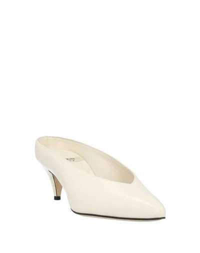 Shop Marskinryyppy Mules & Clogs In White