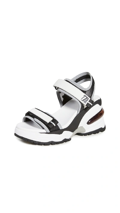 Shop Ash Deep Wedge Sandals In Black/silver