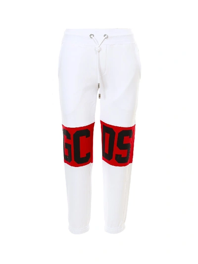 Shop Gcds Trousers In White