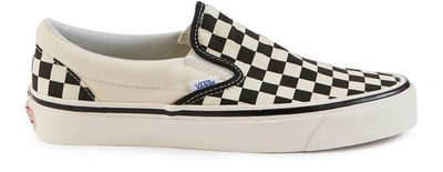 Shop Vans Classic Slip On Trainers In Checker Board/black/white