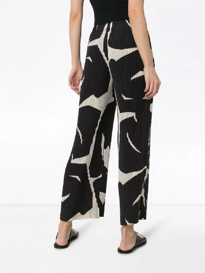 Shop Issey Miyake Cuddle Pleats Trousers In Black