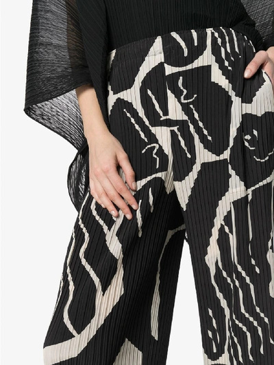 Shop Issey Miyake Cuddle Pleats Trousers In Black