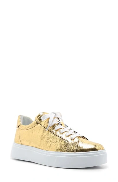 Shop Schutz Raver Platform Sneaker In Gold Leather
