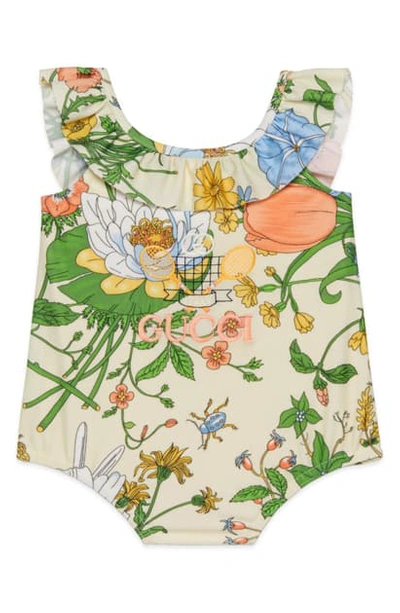 Shop Gucci Flora Tennis Logo Ruffle One-piece Swimsuit In Magnolia/ Pastel Print