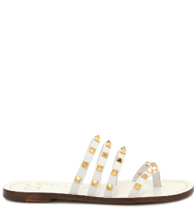 Shop Valentino Rockstud Leather Sandals In White