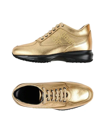 Shop Hogan Sneakers In Gold
