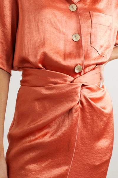 Shop Nanushka Samara Twist-front Washed-satin Midi Skirt In Pastel Orange