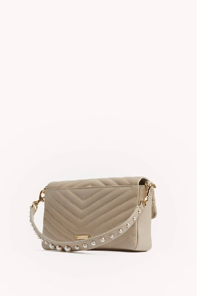 Shop Rebecca Minkoff Tan Edie Baguette | Pearl Crossbody Strap |  In Tahini