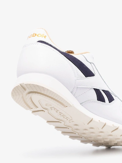 Shop Reebok White Classic Low Top Leather Sneakers