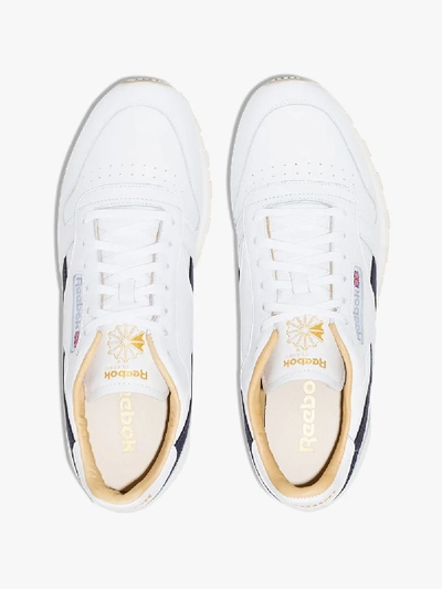 Shop Reebok White Classic Low Top Leather Sneakers