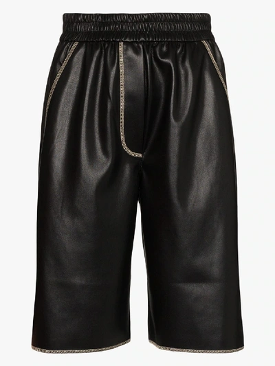 Shop Nanushka Yolie Vegan Leather Shorts In Black