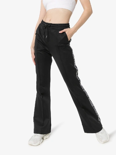 Shop Daily Paper Tape Logo Flared Track Pants In Black
