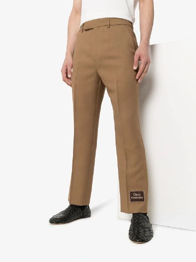 Shop Gucci Logo Patch Cropped Trousers In Brown