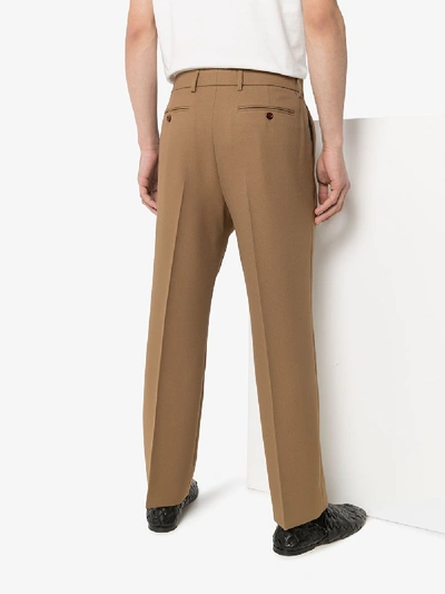 Shop Gucci Logo Patch Cropped Trousers In Brown