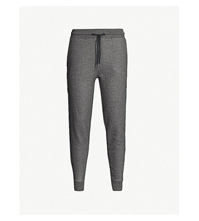 Shop Tommy Hilfiger Tapered Cotton-jersey Jogging Bottoms In Grey