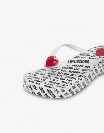 Shop Love Moschino Pvc Flip Flop Sandals Transparent Heart In White