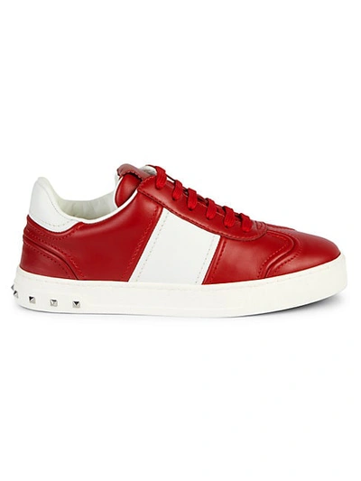 Shop Valentino Rockstud Leather Sneakers In Red