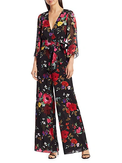 Shop Alice And Olivia Rowley Floral Jumpsuit In Paint Floral Black