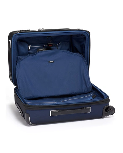 Shop Tumi Arrive International Dual Access 4 Wheel Carryon Luggage In Navy