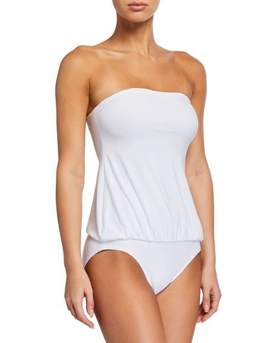 Shop Norma Kamali Mio Strapless Babydoll One-piece Swimsuit In White