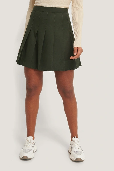 Shop Romy X Na-kd Pleated Short Skirt - Green In Dark Green