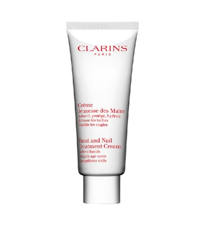 Shop Clarins Hand And Nail Treatment Cream (100ml) In White