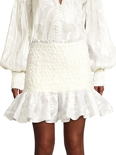 Shop Alexis Lotus Smocked Mini Skirt In White