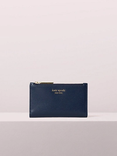 Shop Kate Spade Spencer Small Slim Bifold Wallet In Nightcap Blue