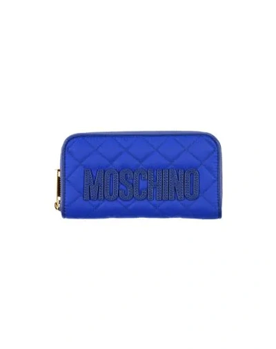 Shop Moschino Wallets In Blue