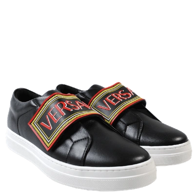 Shop Versace Young  90&apos;s Low Top Trainers In Black