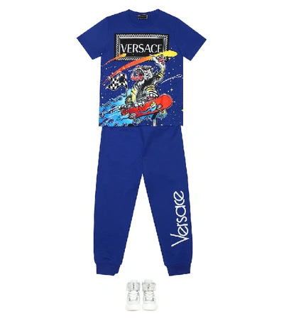 Shop Versace Cotton Trackpants In Blue