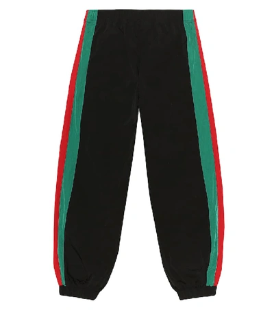 Shop Gucci Web Stripe Jersey Track Pants In Black