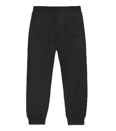 Shop Versace Printed Cotton Trackpants In Black