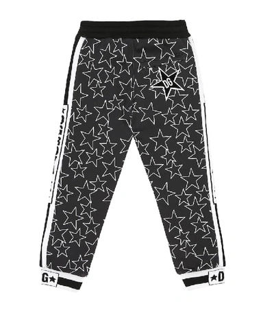 Shop Dolce & Gabbana Star-printed Cotton Trackpants In Black