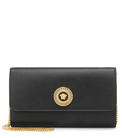 Shop Versace Medusa Leather Clutch In Black