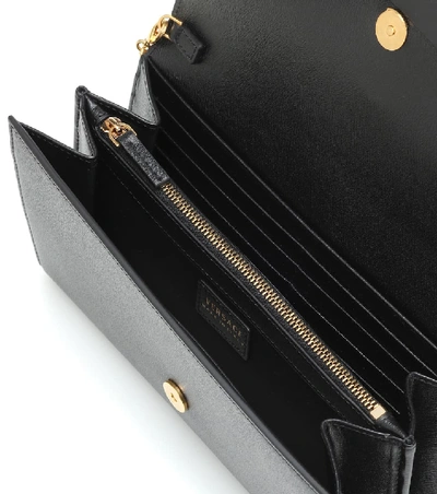 Shop Versace Medusa Leather Clutch In Black