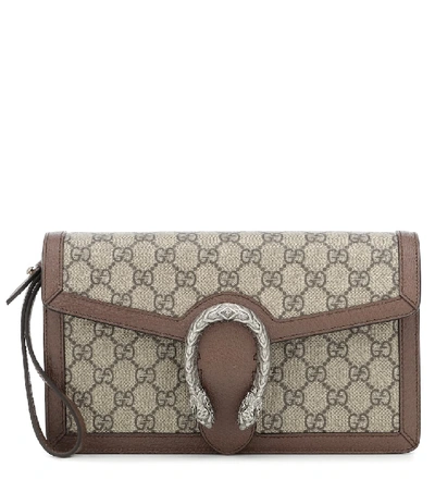 Shop Gucci Dionysus Gg Supreme Clutch In Beige