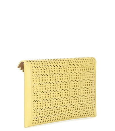 Shop Alaïa Louise Leather Clutch In Yellow