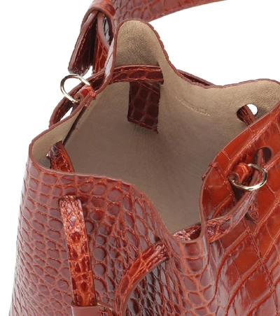 Shop Nanushka Minee Faux Leather Bucket Bag In Brown