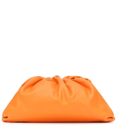 Shop Bottega Veneta Pouch Leather Clutch In Orange