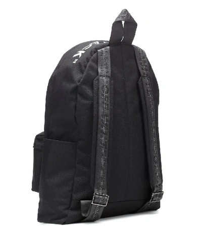 Shop Off-white Quote Printed Canvas Backpack In Black