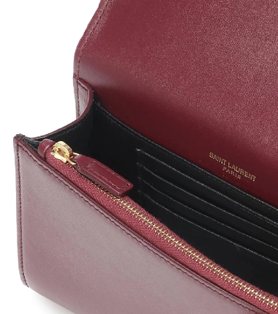 Shop Saint Laurent Kate Leather Belt Bag In Red