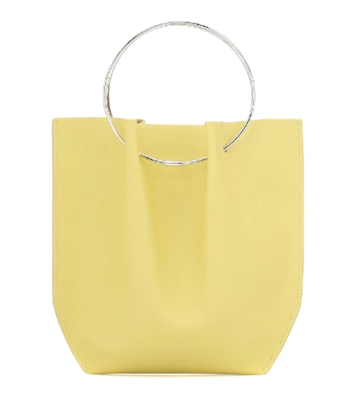 Shop The Row Flat Micro Circle Leather Tote In Yellow