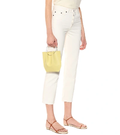 Shop The Row Flat Micro Circle Leather Tote In Yellow