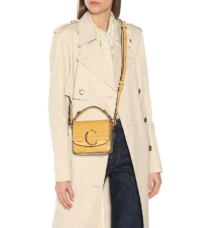 Shop Chloé C Mini Leather Shoulder Bag In Gold