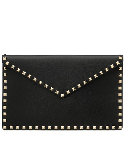 Shop Valentino Rockstud Large Leather Clutch In Black