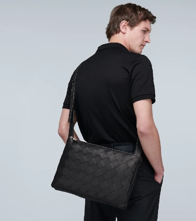 Shop Bottega Veneta Intrecciato Leather Messenger Bag In Black