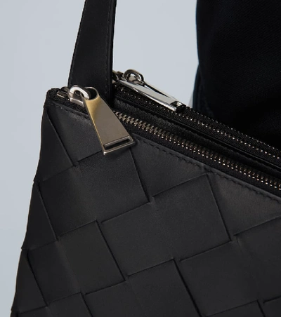 Shop Bottega Veneta Intrecciato Leather Messenger Bag In Black