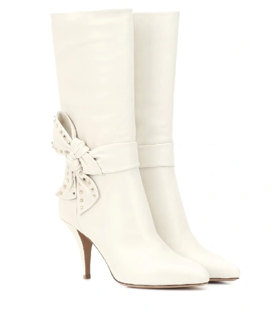 Shop Valentino Rockstud Side Bow Leather Boots In White