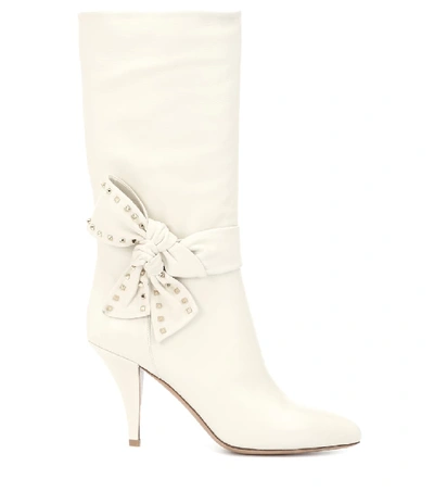 Shop Valentino Rockstud Side Bow Leather Boots In White